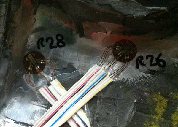 Mounted strain gages before protective coating